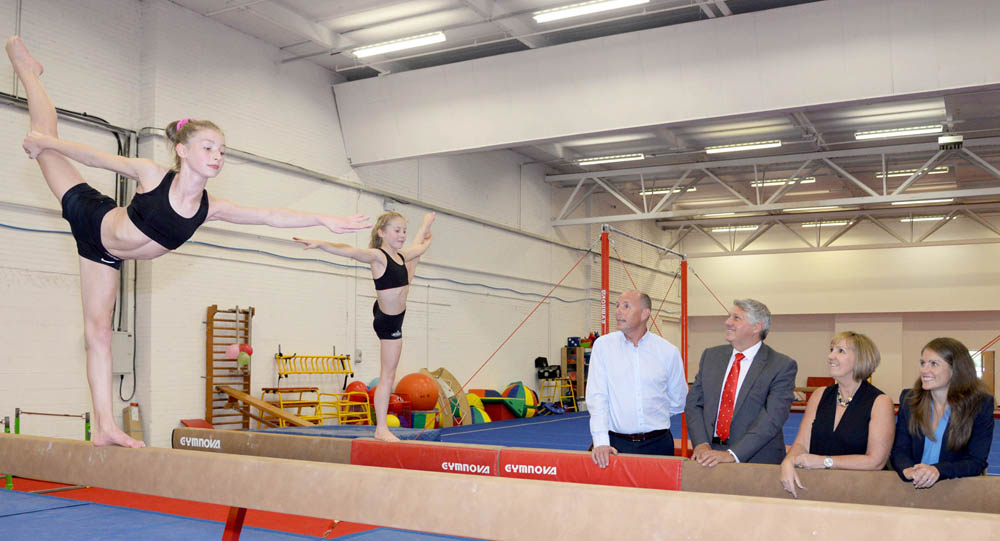 Gymnasts on balancing beams